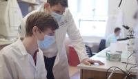 James McIntosh, PhD and Jason B. Carmel, MD, PhD in the lab